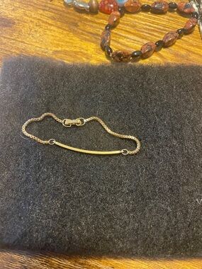 Delicate Gold Curved Bar Bracelet - Women's Jewelry